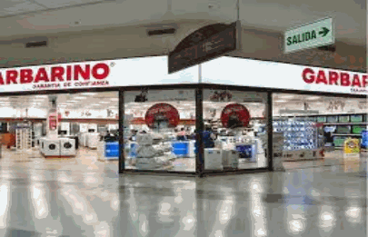 Piden el desalojo de Garbarino y Compumundo de Factory Parque Brown