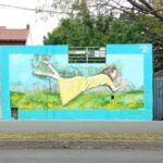 De Ucrania a Saavedra: el artista Indigo Ars pintó un mural basado en el fotógrafo Peter Kladyk