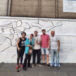 Almagro: con la presencia de Taty Almeida, vecinos reconstruyeron el mural por la Memoria en el Polideportivo de Sarmiento y Medrano