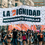 Caravana del Movimiento Popular La Dignidad frente a sedes de empresas de alimentos