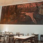 La Boca: repararon un mural de Quinquela Martín ubicado dentro de un aula escolar